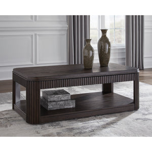 A room setting featuring Carlibrie Warm Brown Lift Top Coffee Table