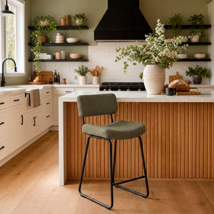 A room setting featuring Malory Avocado Counter Stool