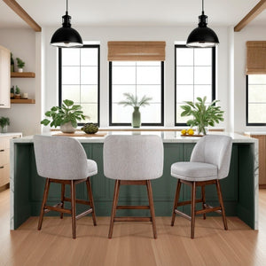A room setting featuring Sadie Taupe Swivel Counter Stool