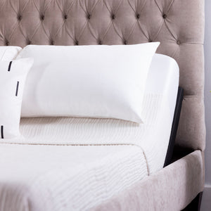 A room setting featuring Pro-Motion Black Twin XL Adjustable Base