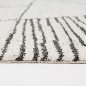 Side view of Barrell Charcoal 5x8 Abstract Rug