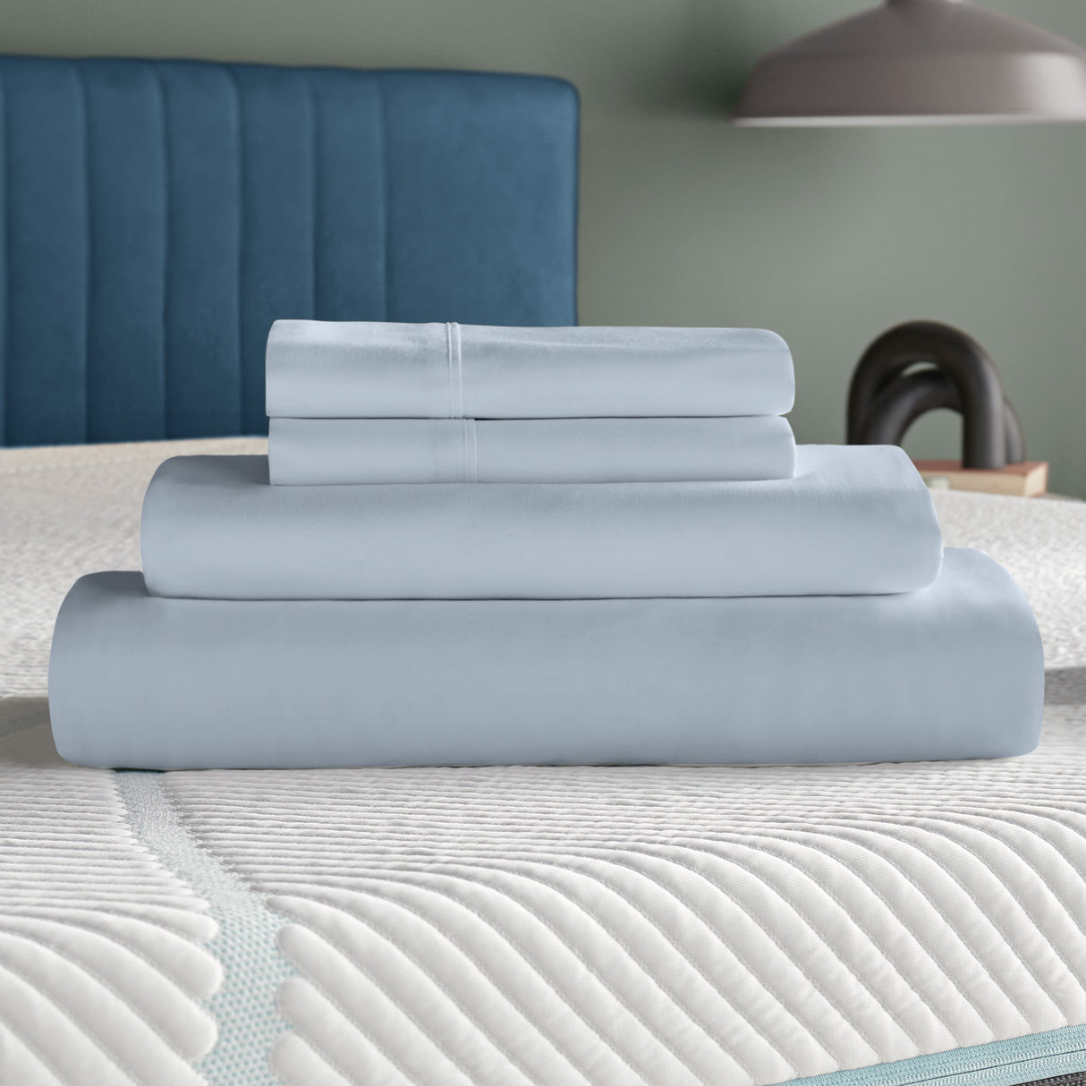 A room setting featuring Tempur-Adapt Blue King Luxe Egyptian Cotton Pillowcases