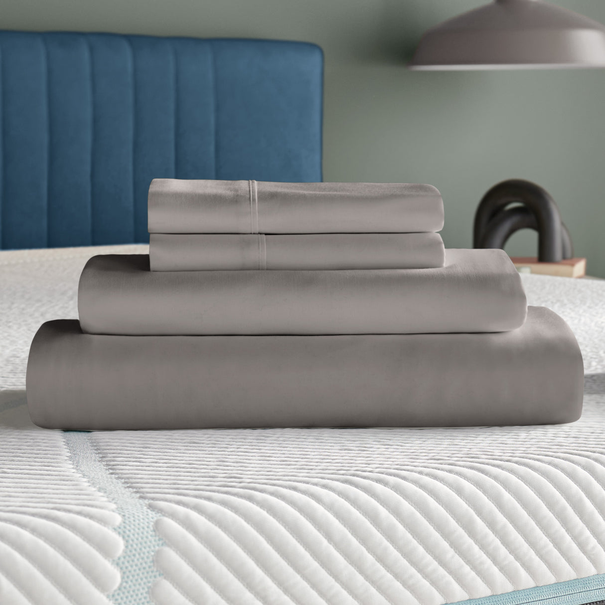 A room setting featuring Tempur-Adapt Graphite Queen Luxe Egyptian Cotton Pillowcases
