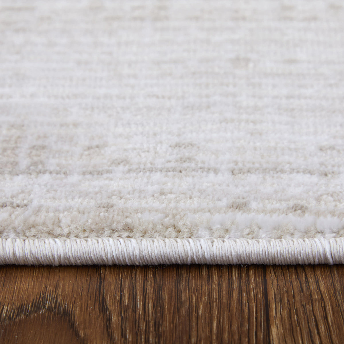 Side view of Deja 39PJF Beige 5x8 Rug