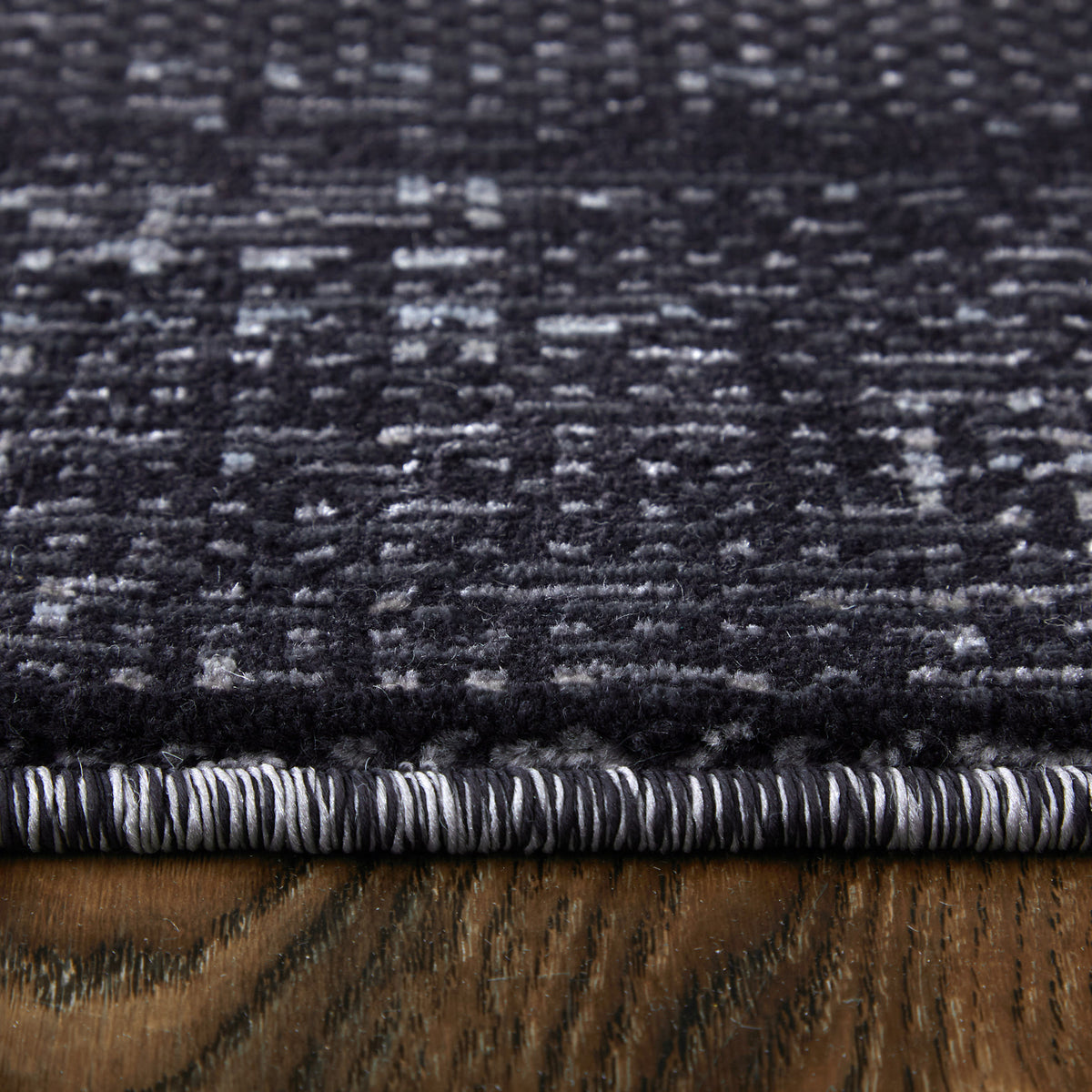 Side view of 5'x8' Rugs Charcoal Deja 39PJF Rug