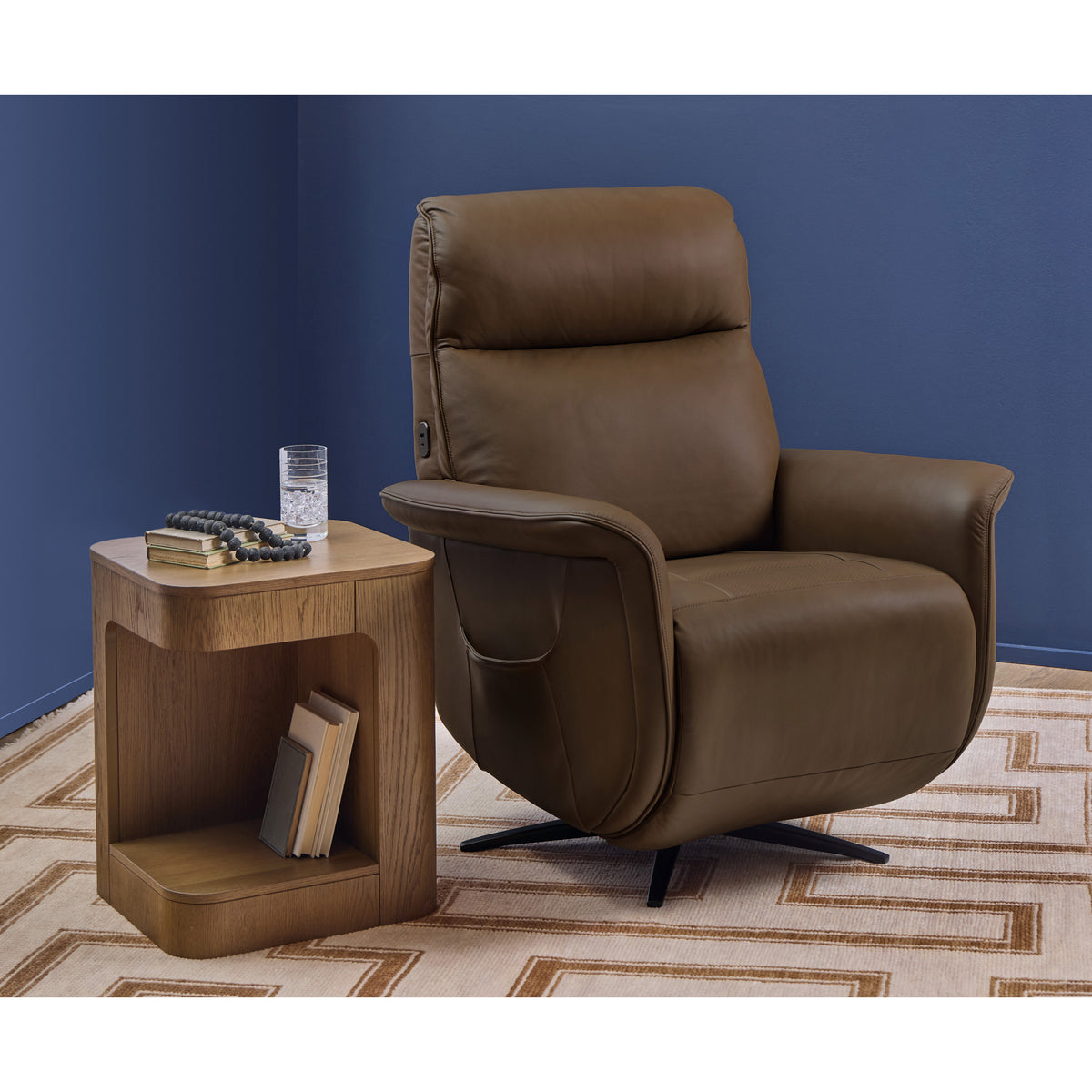 A room setting featuring Riverstone Haven Power Swivel Recliner