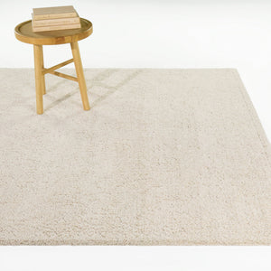 A room setting featuring Hilaeira Gray 8x10 Rug