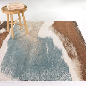 A room setting featuring Tiselius Blue 5x8 Rug