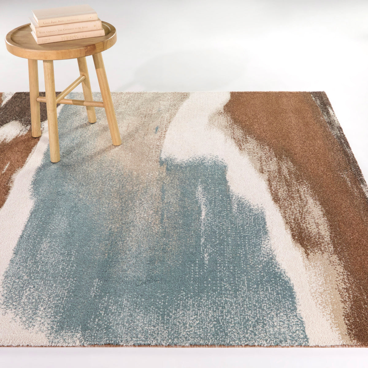 A room setting featuring Tiselius Blue 8x10 Rug