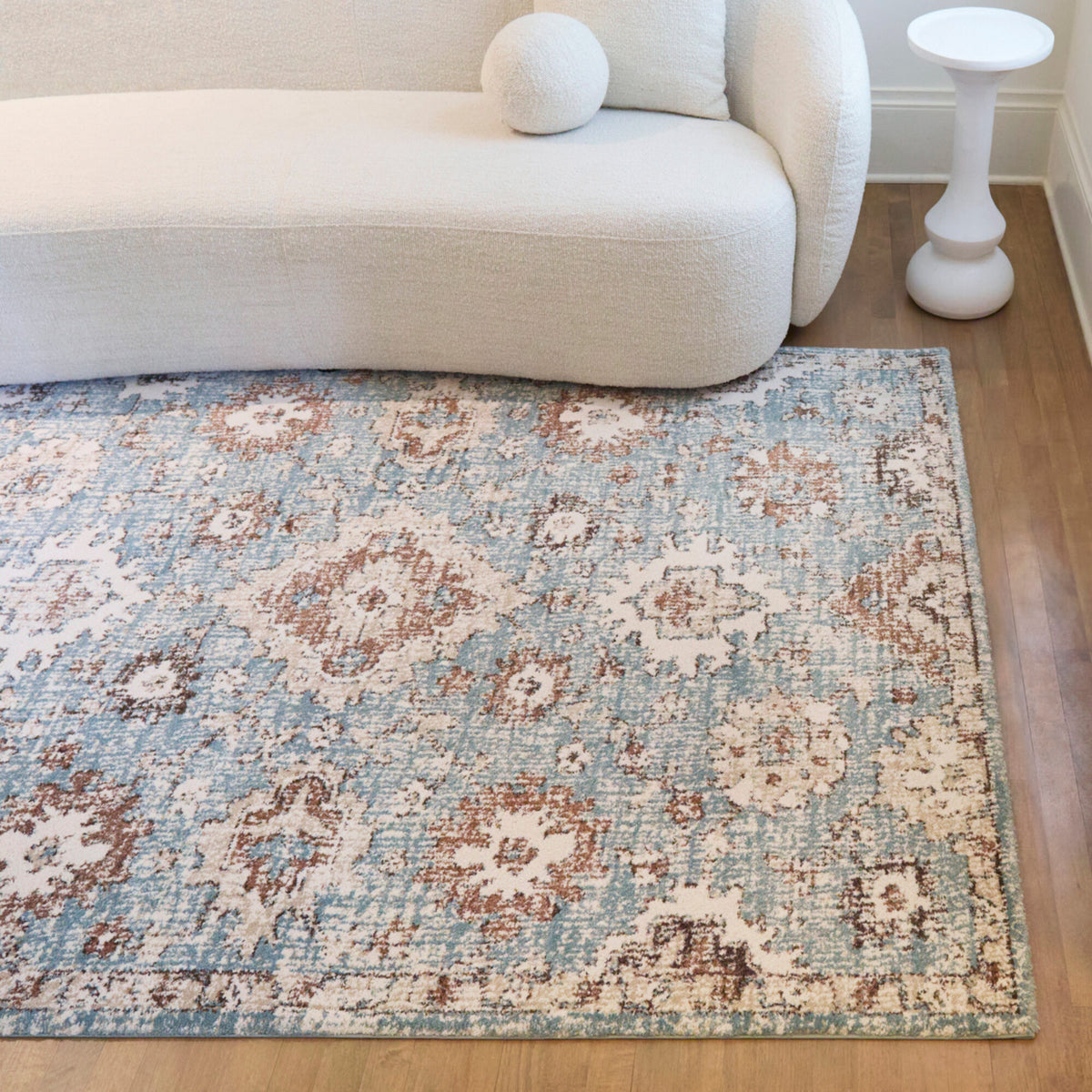 A room setting featuring Annan Blue 8x10 Rug