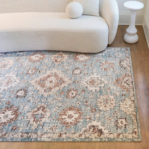 A room setting featuring Annan Blue 8x10 Rug