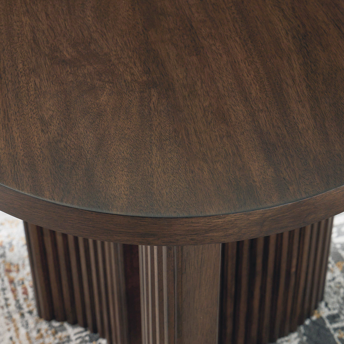 Detail view of Korestone Brown Round End Table