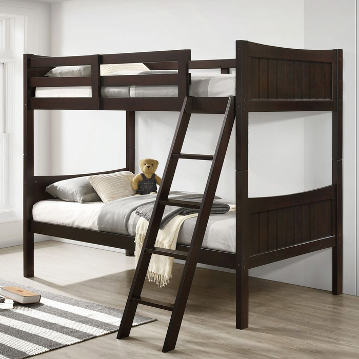 Wooden bunk bed with a teddy bear on top in a room setting
