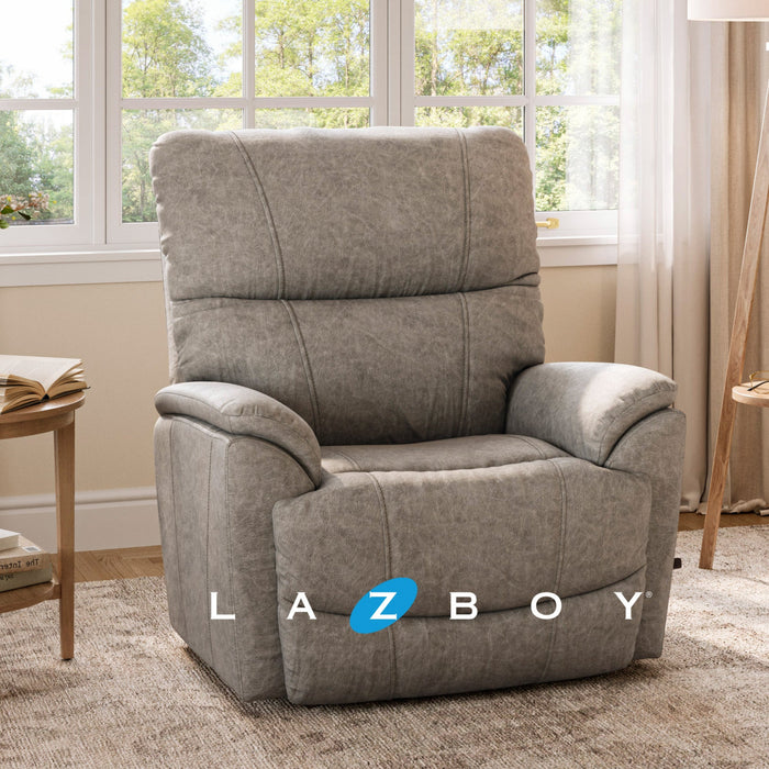 Gray recliner chair in a living room with LAZBOY logo
