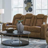 Wolfridge Power Reclining Sofa in a decorated living room